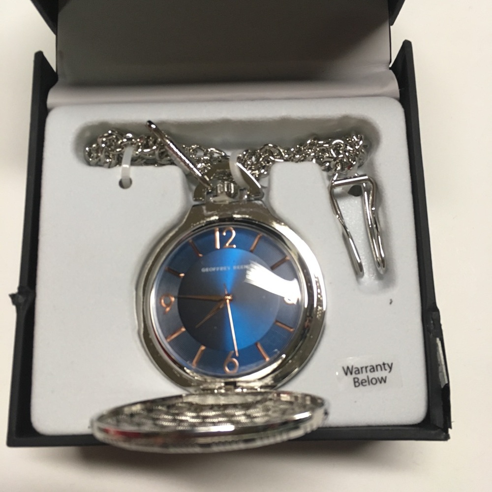 Geoffrey Beene Silver stopwatch